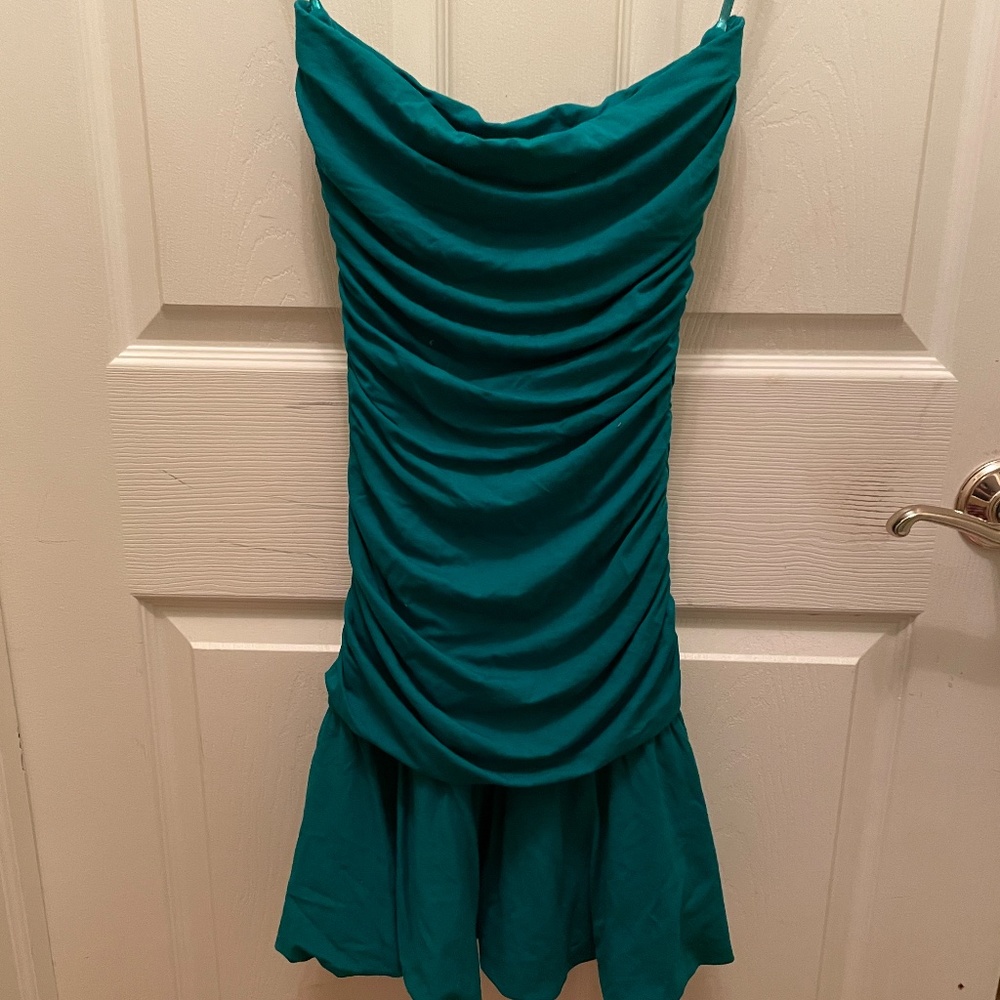 Strapless beautiful green cascading dress.